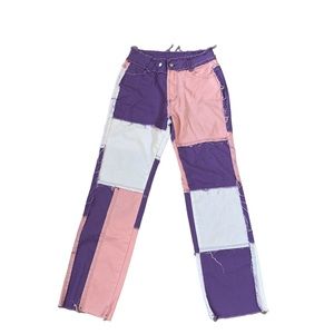 Women’s medium patchwork Y2K pink, white, and purple pants.